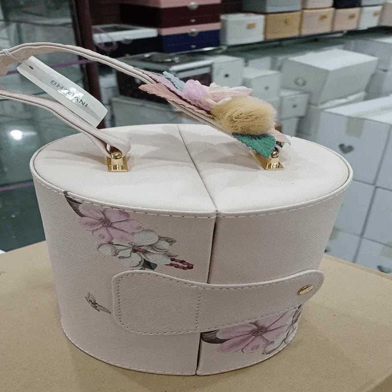 3 tier round case made of leather - Prozone