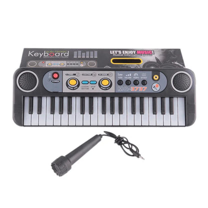 Mini electric piano keyboard with microphone - Prozone