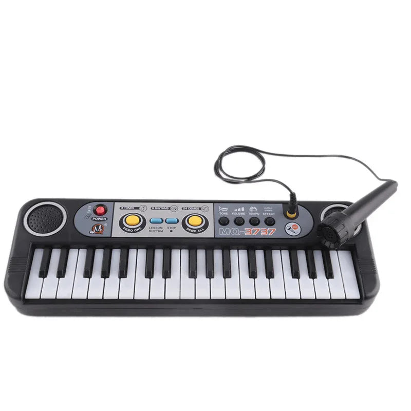 Mini electric piano keyboard with microphone - Prozone