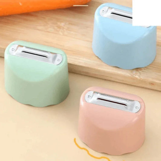 Anti splash fruit and vegetable peeler - Prozone